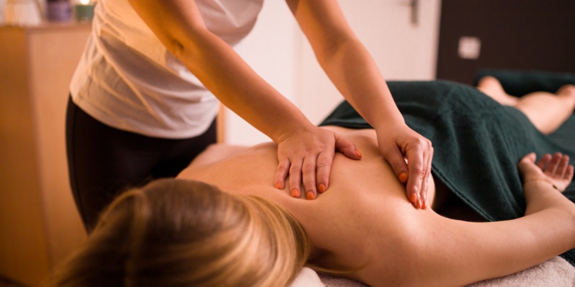 A picture of a woman getting a massage