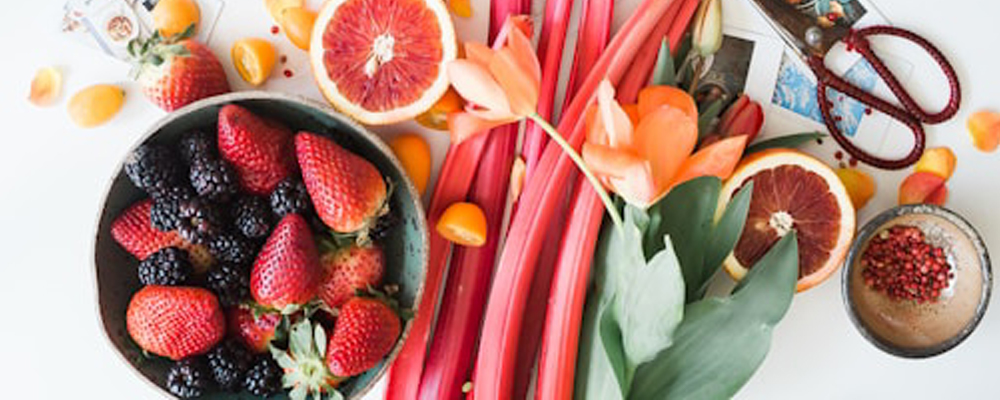 a photo of collorful fruits on a table.